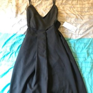 Brand new black spring dress by Elia-Cher